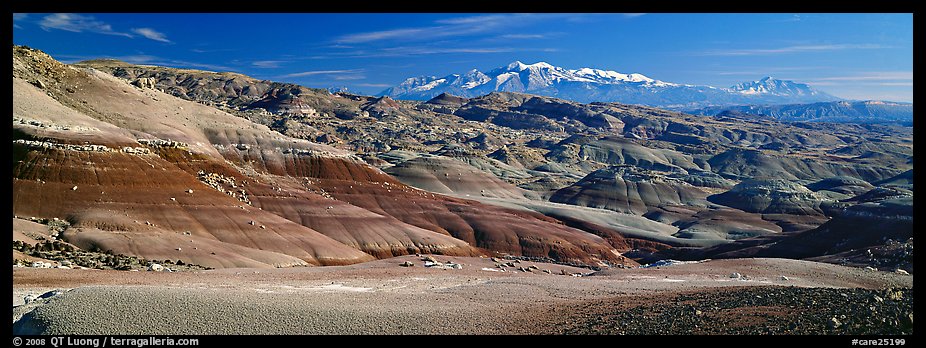 Mudstone landscape and snowy mountains, Cathedral Valley. Capitol Reef National Park (color)