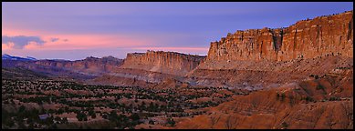 Sandstone cliffs at sunset. Capitol Reef National Park (Panoramic color)