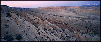 Earth crust wrinkle of  Waterpocket Fold at dusk. Capitol Reef National Park (Panoramic color)
