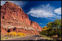 Rood, cliffs, and orchard in autumn. Capitol Reef National Park, Utah, USA. (color)
