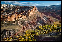 Waterpocket Fold cliffs and orchards from Rim Overlook in the fall. Capitol Reef National Park, Utah, USA. (color)