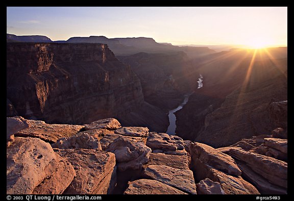 Cracked rocks and Colorado River at Toroweap, sunset. Grand Canyon National Park, Arizona, USA.