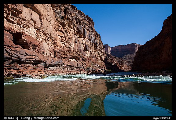 River-level view of glassy waters before rapids, Marble Canyon. Grand Canyon National Park, Arizona, USA.