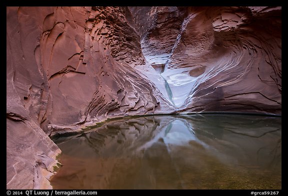 Reflection pool at base of sculpted spillway, North Canyon. Grand Canyon National Park (color)