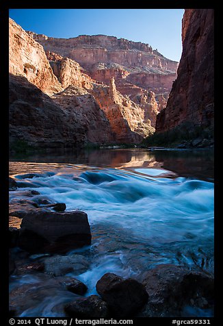 Rapids, reflections, and cliffs, early morning, Marble Canyon. Grand Canyon National Park, Arizona, USA.