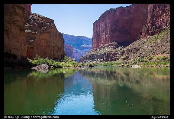 Canyon walls, Colorado River, vegetation, and reflections. Grand Canyon National Park, Arizona, USA.