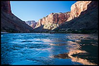 Cliffs reflected in Colorado River rapids, morning. Grand Canyon National Park ( color)