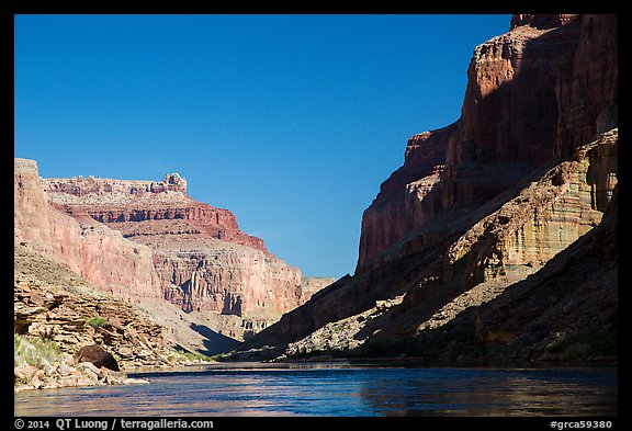 Cliffs, shadows, blue water and sky, Marble Canyon. Grand Canyon National Park, Arizona, USA.