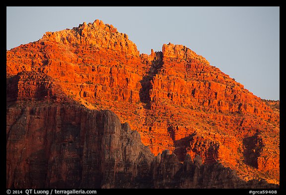 Last light illuminates distant cliffs. Grand Canyon National Park, Arizona, USA.