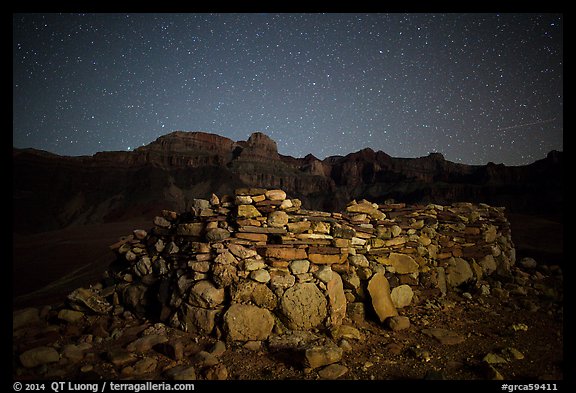 Ancient ruin and South Rim at night. Grand Canyon National Park, Arizona, USA.