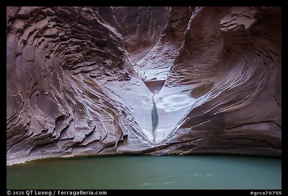 The sculpted pour-off at the end of North Canyon above a green pool in a dry year. Grand Canyon National Park (color)