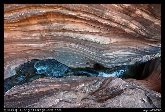 Deer Creek threads through a narrow chasm where water carves fluid paths into banded sandstone.. Grand Canyon National Park (color)
