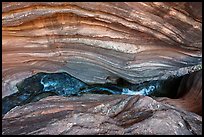 Deer Creek threads through a narrow chasm where water carves fluid paths into banded sandstone.. Grand Canyon National Park ( color)
