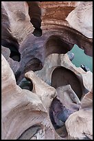Water-sculpted potholes carved in a surreal swirl of pastel-colored rock. Grand Canyon National Park ( color)
