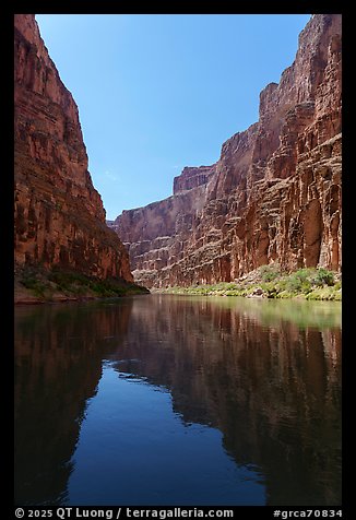 Towering walls close in under a midday sun. Grand Canyon National Park (color)