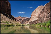 Blue sky and sheer cliffs mirror perfectly on the water near Whitmore Wash. Grand Canyon National Park ( color)