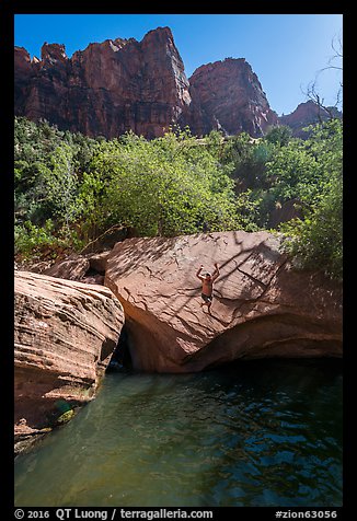 Man jumps from rock into water, Pine Creek. Zion National Park (color)