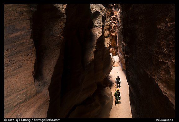 Canyonneers walk in Pine Creek Canyon narrows. Zion National Park, Utah (color)