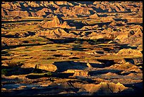 Badland ridges and prairie from above, sunrise. Badlands National Park ( color)