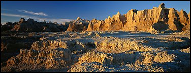 Badlands towers and pinacles, early morning. Badlands National Park (Panoramic color)