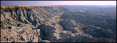 Badlands carved into prairie by erosion, Stronghold Unit. Badlands National Park (Panoramic color)