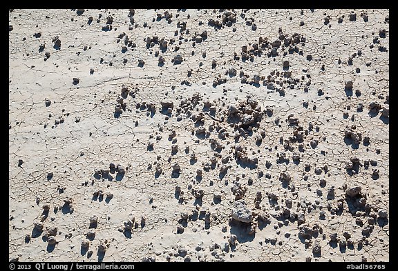 Rocks on cracked soil. Badlands National Park, South Dakota, USA.