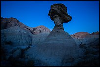 Pedestal rock at badlands at dusk. Badlands National Park ( color)