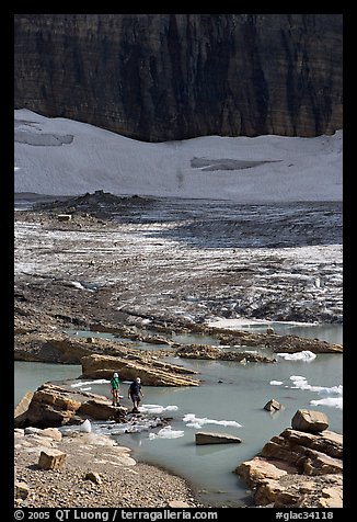 Crossing the outlet stream of the Grinnell glacial lake. Glacier National Park (color)