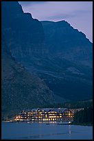 Many Glacier lodge and Swiftcurrent Lake at dusk. Glacier National Park, Montana, USA.