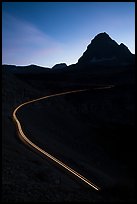 Going-to-the-Sun road at dusk with car light trail. Glacier National Park ( color)