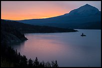 Saint Mary Lake and Wild Goose Island with colors of sunrise in clouds. Glacier National Park ( color)