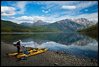 Kayaker readying gear, Kintla Lake. Glacier National Park ( color)