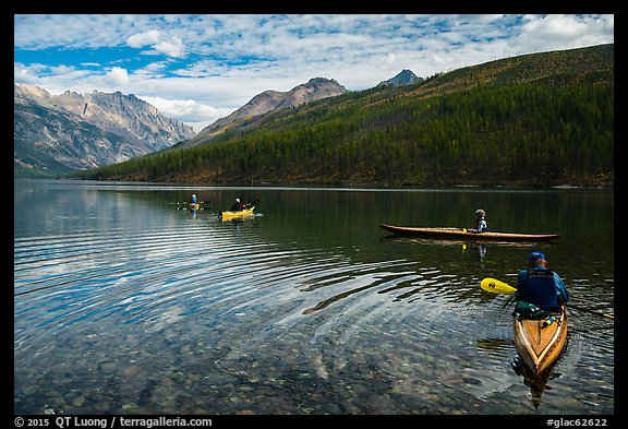 Four kayakers on Kintla Lake. Glacier National Park, Montana, USA.