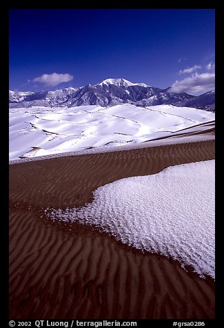 Sand dunes with snow patches. Great Sand Dunes National Park, Colorado, USA.