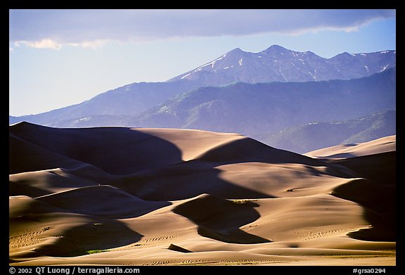 Distant view of dunes and Sangre de Christo mountains in late afternoon. Great Sand Dunes National Park and Preserve (color)
