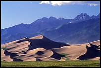 Distant view of Dunes and Crestone Peaks in late afternoon. Great Sand Dunes National Park, Colorado, USA. (color)