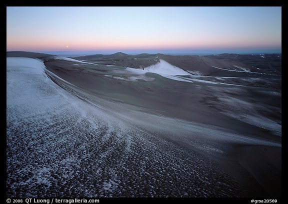 Sparse snow on the dunes at dawn. Great Sand Dunes National Park and Preserve, Colorado, USA.