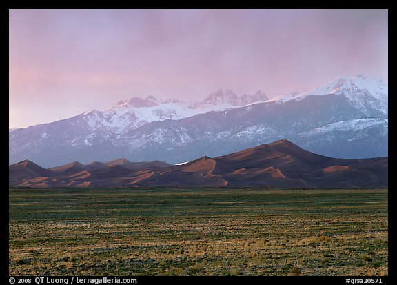 Flats, sand dunes, and snowy Sangre de Christo mountains. Great Sand Dunes National Park and Preserve (color)