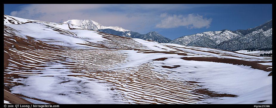 Melting snow on sand dunes. Great Sand Dunes National Park and Preserve, Colorado, USA.