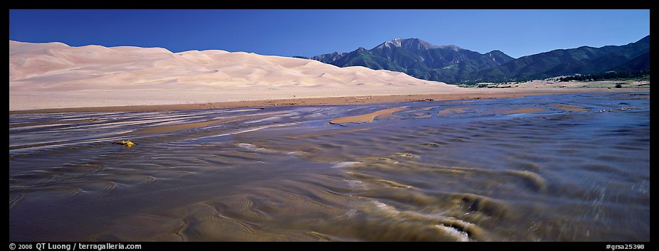 Wide shallow creek at the base of dune field. Great Sand Dunes National Park and Preserve (color)