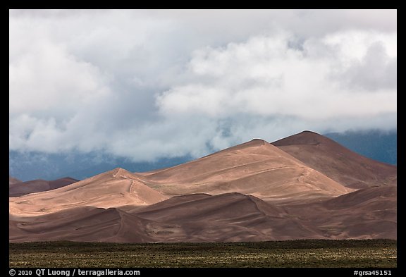 Tall dunes and low clouds. Great Sand Dunes National Park and Preserve, Colorado, USA.