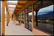 Visitor center and reflections in large windows. Great Sand Dunes National Park and Preserve, Colorado, USA.