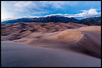 Dunes and Sangre de Cristo mountains at dusk. Great Sand Dunes National Park and Preserve ( color)