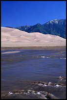 Medano creek, Sand Dunes, and Sangre de Cristo Mountains. Great Sand Dunes National Park and Preserve, Colorado, USA.