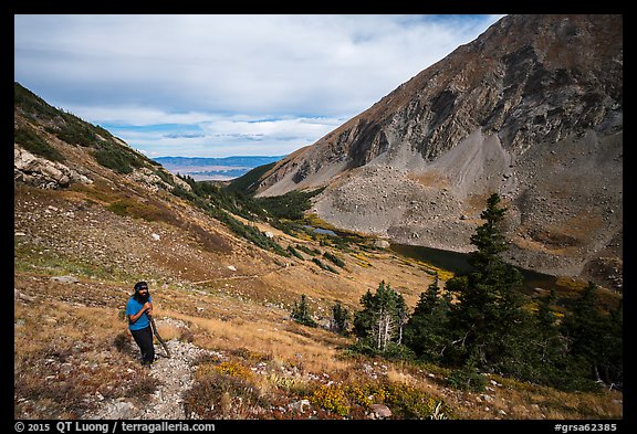 Hiker above Medano Lakes. Great Sand Dunes National Park and Preserve (color)