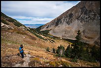Hiker above Medano Lakes. Great Sand Dunes National Park and Preserve ( color)