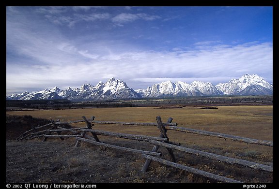 Fence, meadow, and Teton Range. Grand Teton National Park, Wyoming, USA.