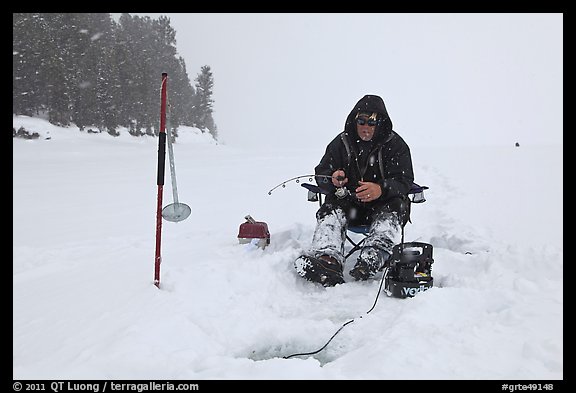 Ice fisherman in white-out, Jackson Lake. Grand Teton National Park (color)