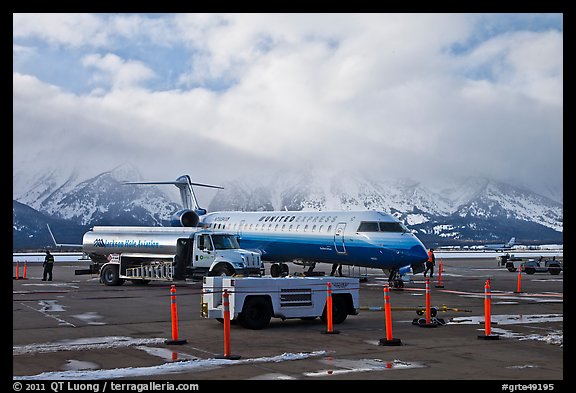 Regional jet and fuel truck, Jackson Hole Airport. Grand Teton National Park (color)