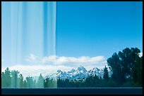 Teton Range, Craig Thomas Discovery and Visitor Center window reflexion. Grand Teton National Park ( color)